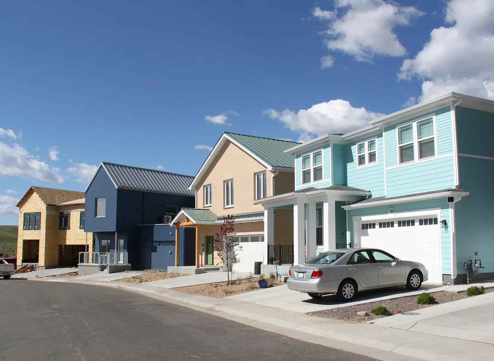 Marshall Fire Rebuild Earth Block House Nestled in Neighborhood