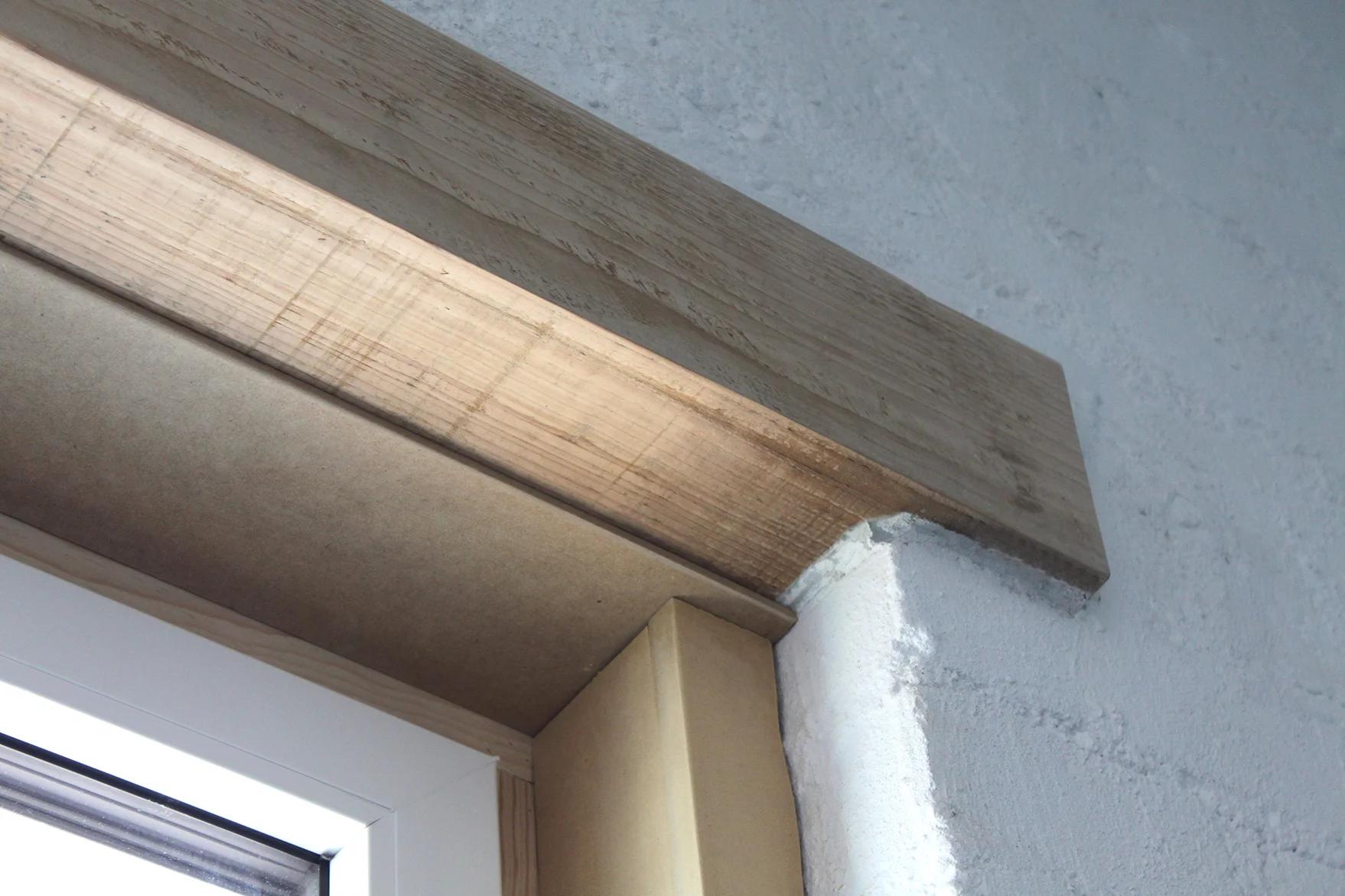 Timber Lintel in Pressed Earth Block Wall